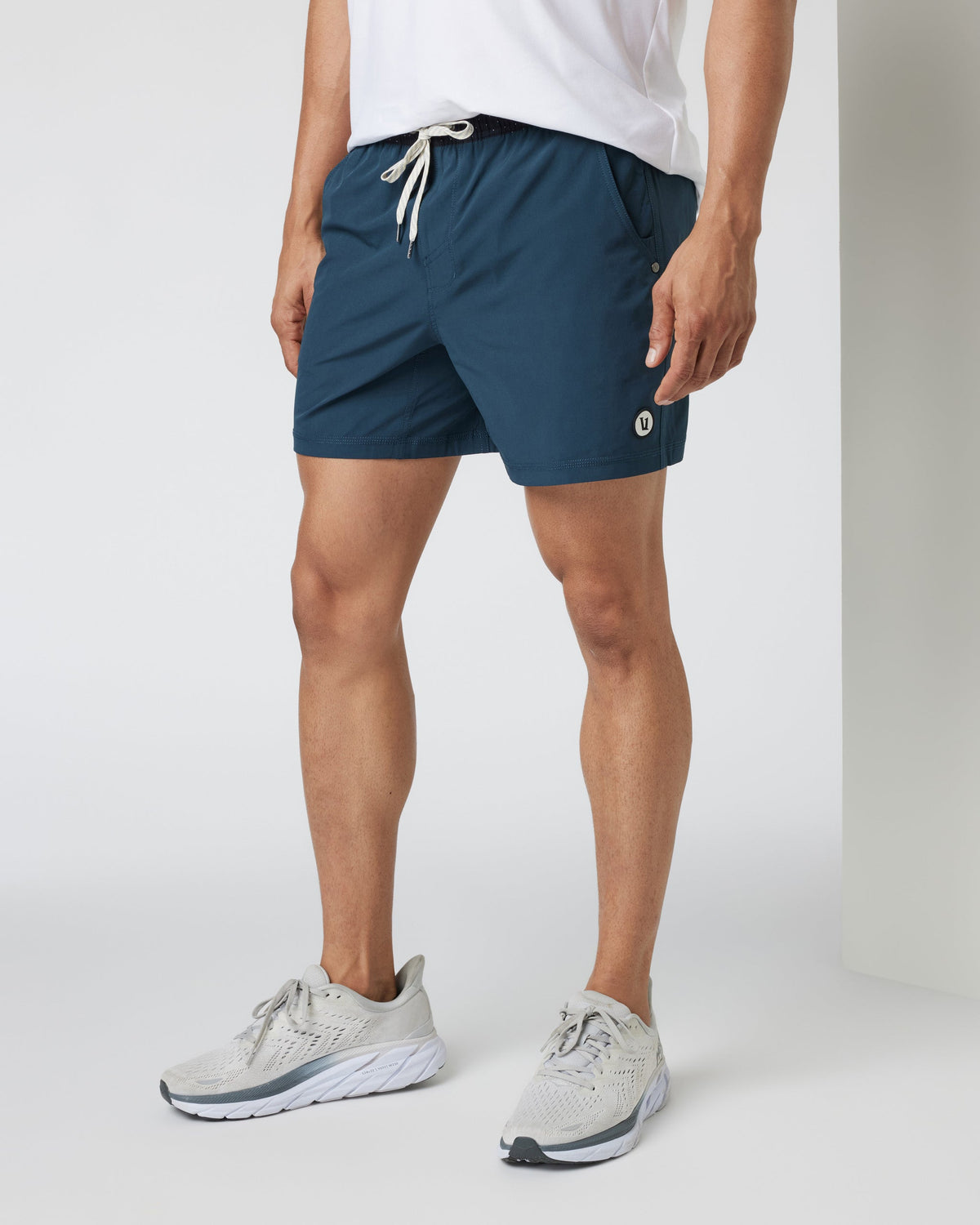 Vuori Kore Short Lined 5" - Indigo, side